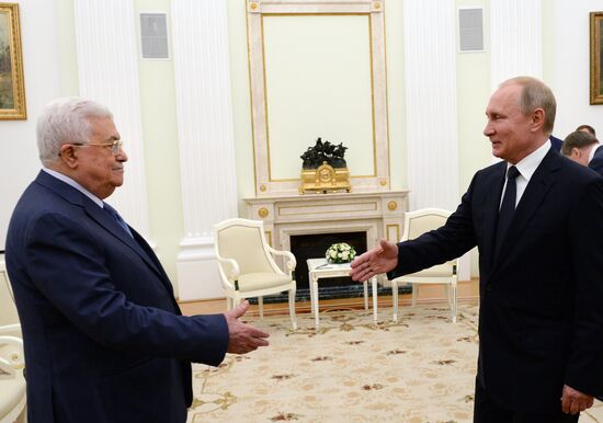 President Vladimir Putin meets with Palestinian President Mahmoud Abbas
