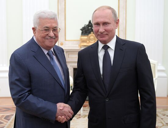 President Vladimir Putin meets with Palestinian President Mahmoud Abbas