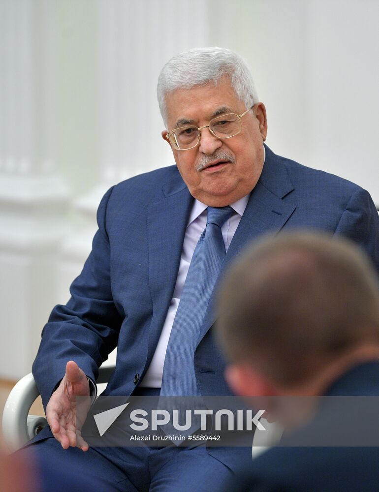 President Vladimir Putin meets with Palestinian President Mahmoud Abbas