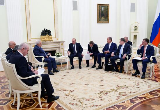 President Vladimir Putin meets with Palestinian President Mahmoud Abbas