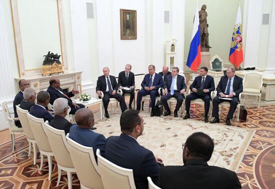 Putin meets with al-Bashir