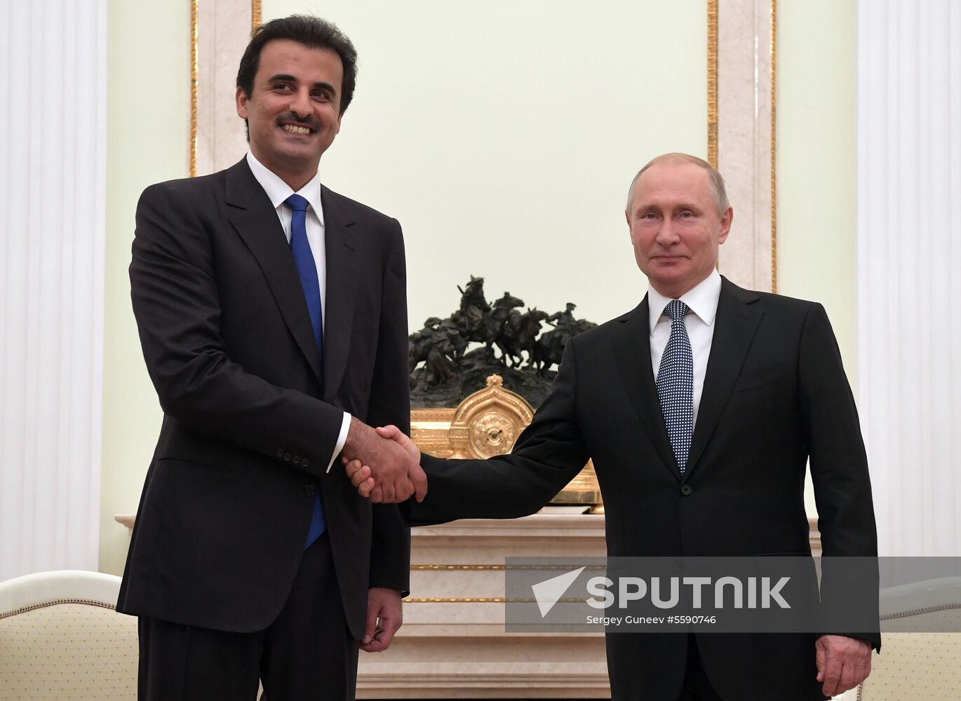 President Vladimir Putin meets with Qatari Emir Tamim bin Hamad Al Thani