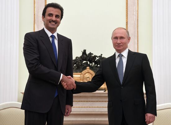 President Vladimir Putin meets with Qatari Emir Tamim bin Hamad Al Thani