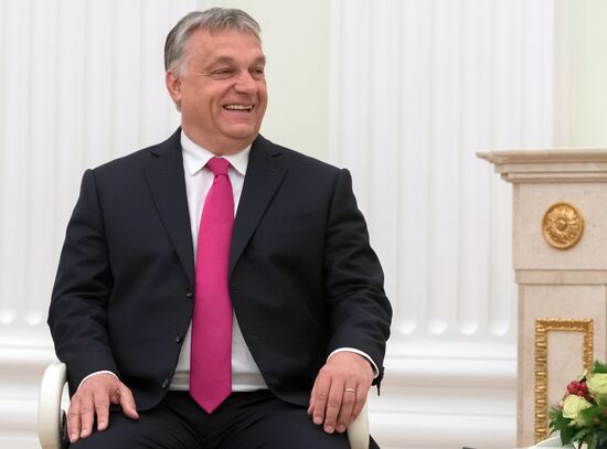 Russian President Vladimir Putin meets with Hungarian Prime Minister Viktor Orban