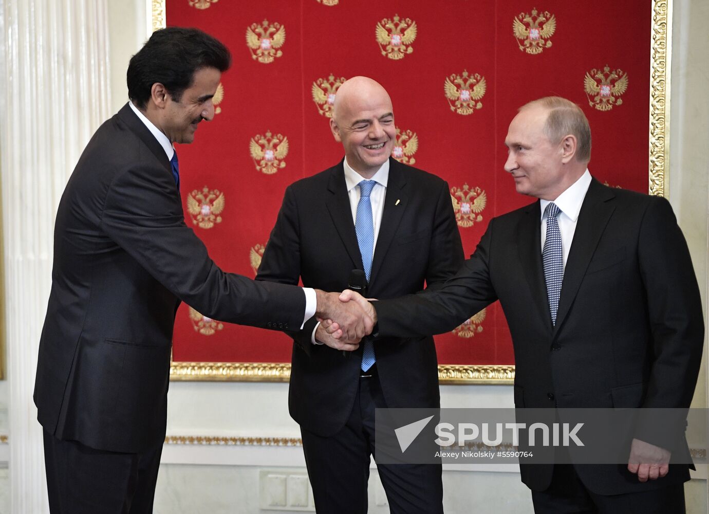 President Putin attends ceremony to hand the World Cup over to 2022 hosts Qatar