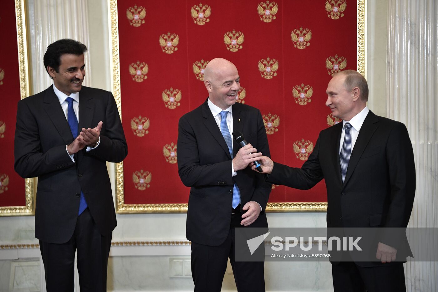 President Putin attends ceremony to hand the World Cup over to 2022 hosts Qatar