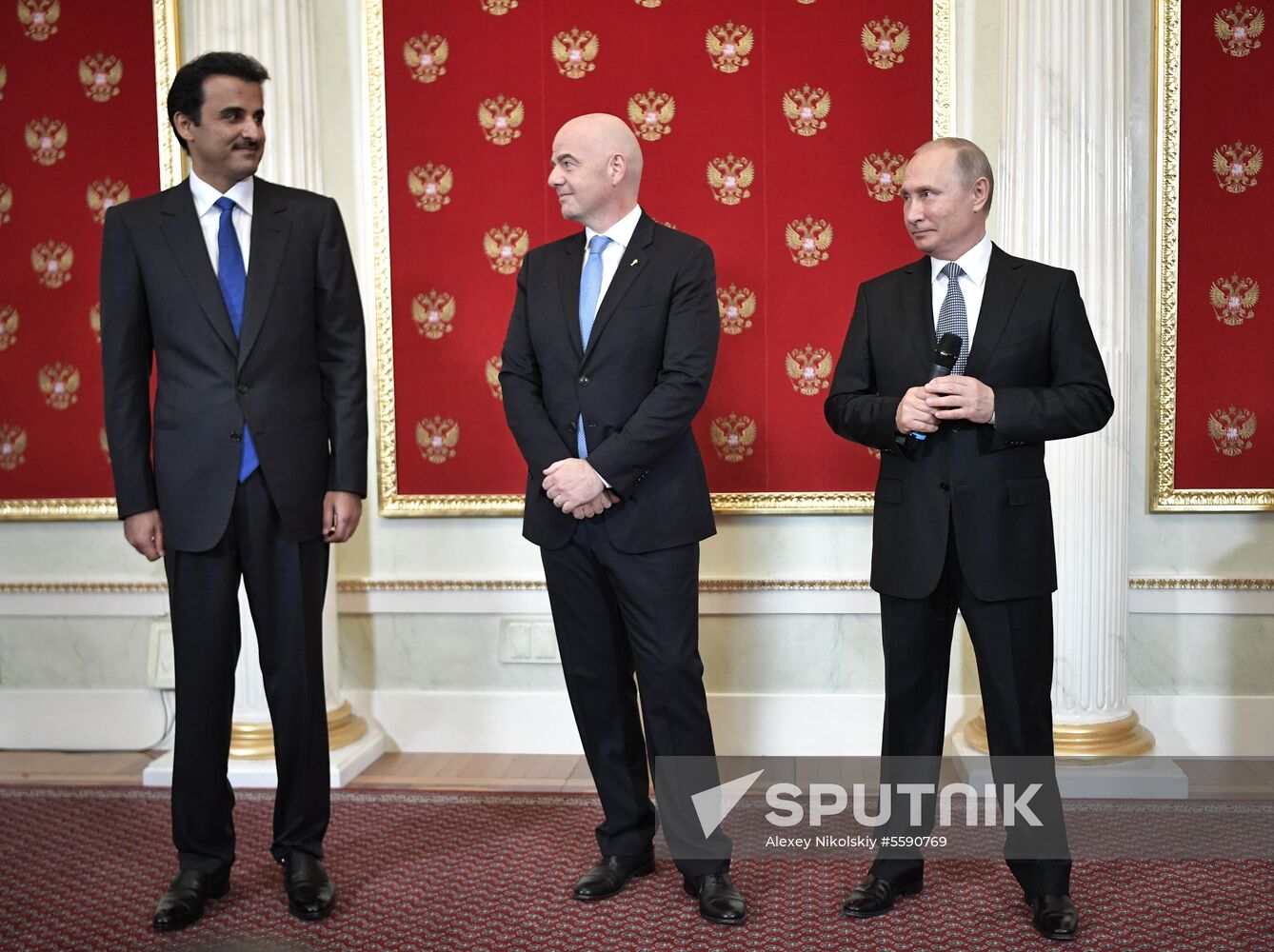 President Putin attends ceremony to hand the World Cup over to 2022 hosts Qatar