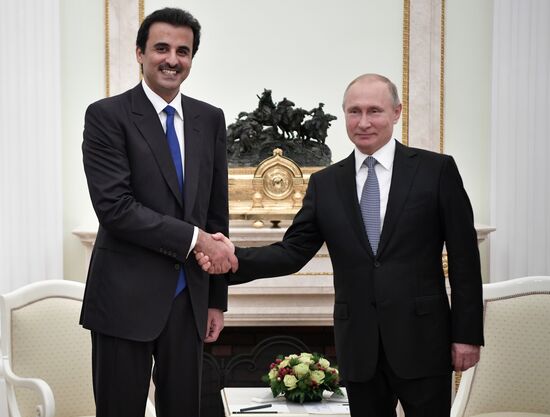 President Vladimir Putin meets with Qatari Emir Tamim bin Hamad Al Thani