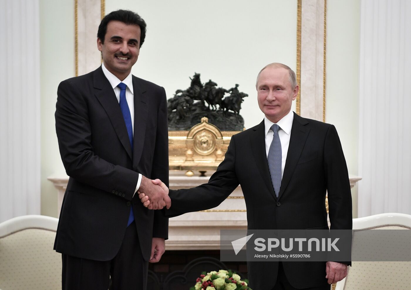 President Vladimir Putin meets with Qatari Emir Tamim bin Hamad Al Thani