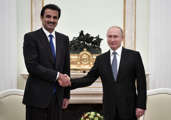 President Vladimir Putin meets with Qatari Emir Tamim bin Hamad Al Thani