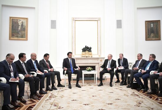 President Vladimir Putin meets with Qatari Emir Tamim bin Hamad Al Thani