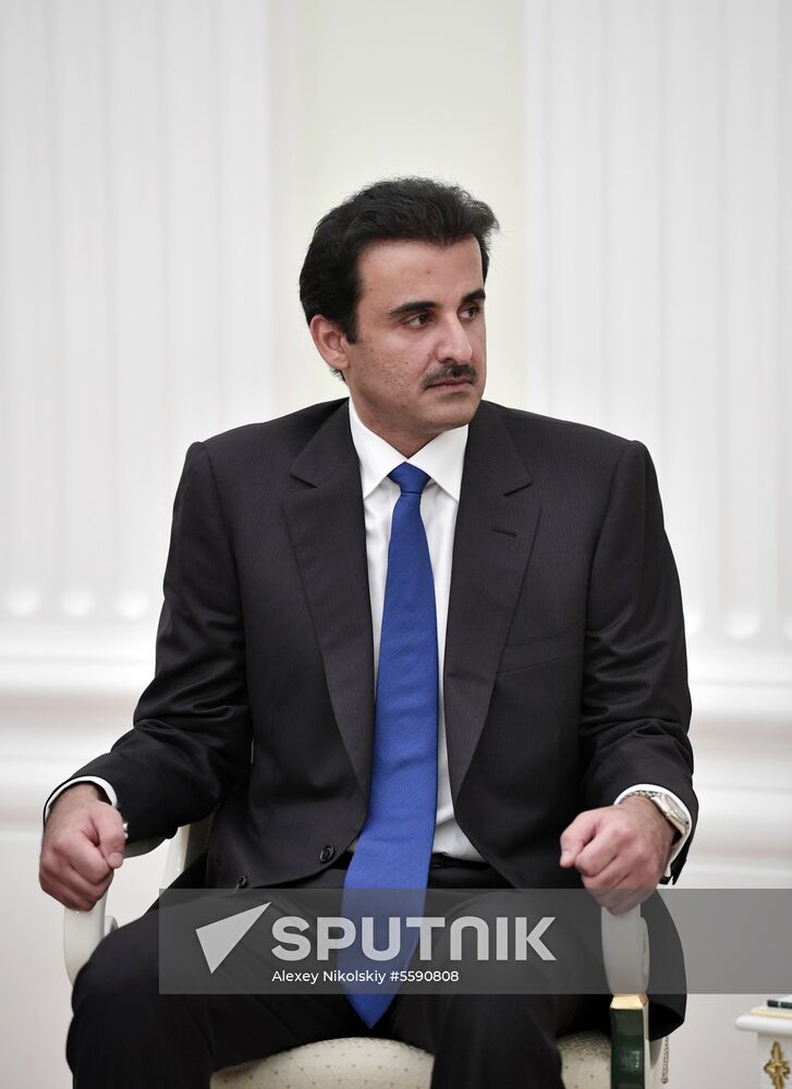 President Vladimir Putin meets with Qatari Emir Tamim bin Hamad Al Thani