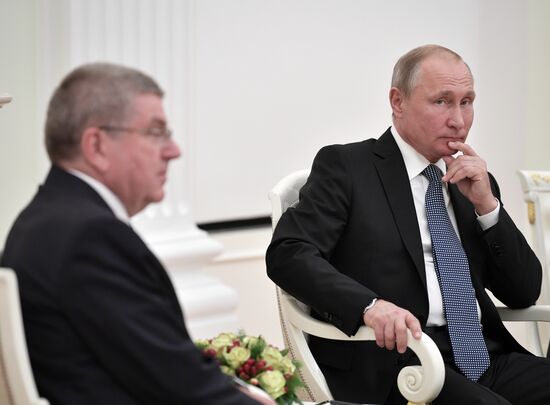President Putin meets with IOC President Thomas Bach