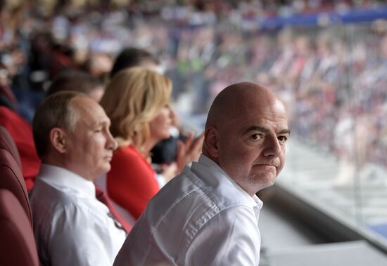 President Vladimir Putin and Prime Minister Dmitry Medvedev attend World Cup final match