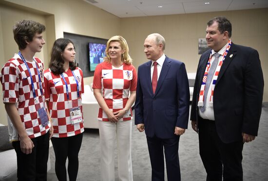 President Vladimir Putin and Prime Minister Dmitry Medvedev attend World Cup final match