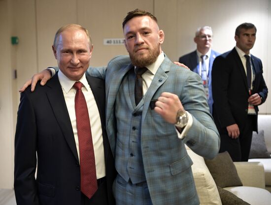 President Vladimir Putin and Prime Minister Dmitry Medvedev attend World Cup final match