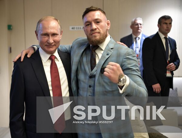 President Vladimir Putin and Prime Minister Dmitry Medvedev attend World Cup final match