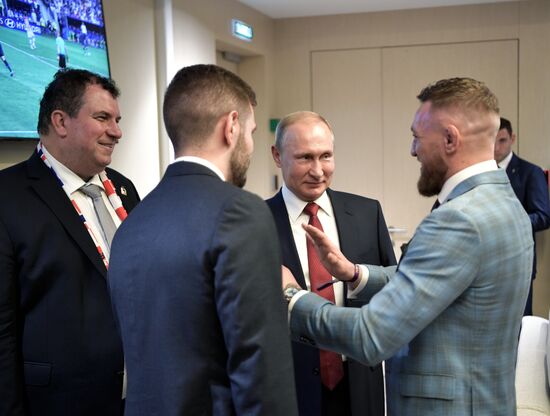 President Vladimir Putin and Prime Minister Dmitry Medvedev attend World Cup final match