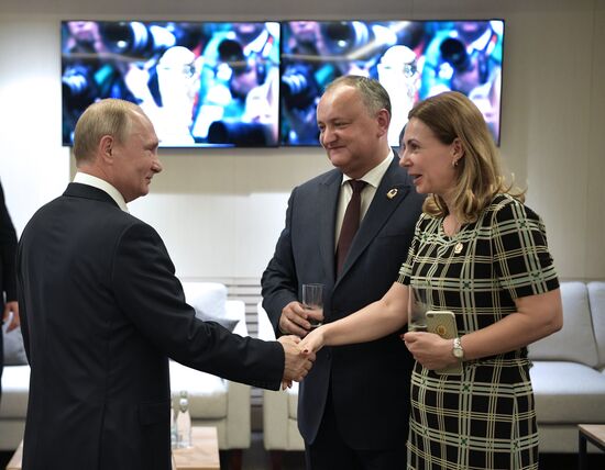 President Vladimir Putin and Prime Minister Dmitry Medvedev attend World Cup final match