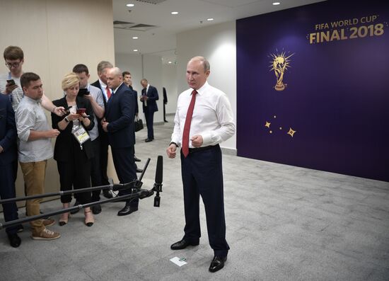 President Vladimir Putin and Prime Minister Dmitry Medvedev attend World Cup final match