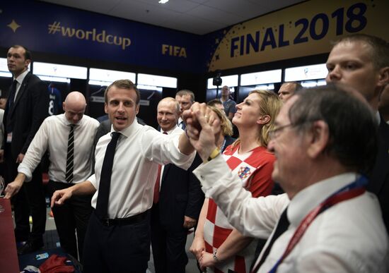 President Vladimir Putin and Prime Minister Dmitry Medvedev attend World Cup final match
