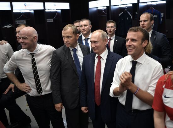 President Vladimir Putin and Prime Minister Dmitry Medvedev attend World Cup final match