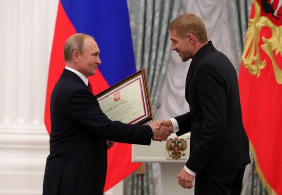 President Putin presents state decorations to Russian national footabll team