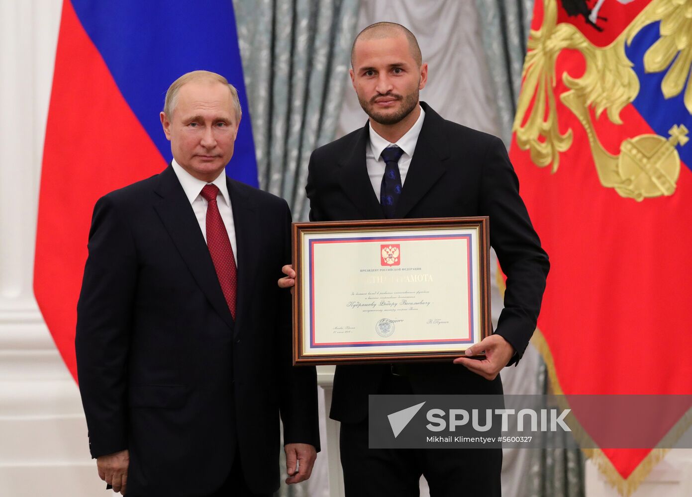 President Putin presents state decorations to Russian national footabll team