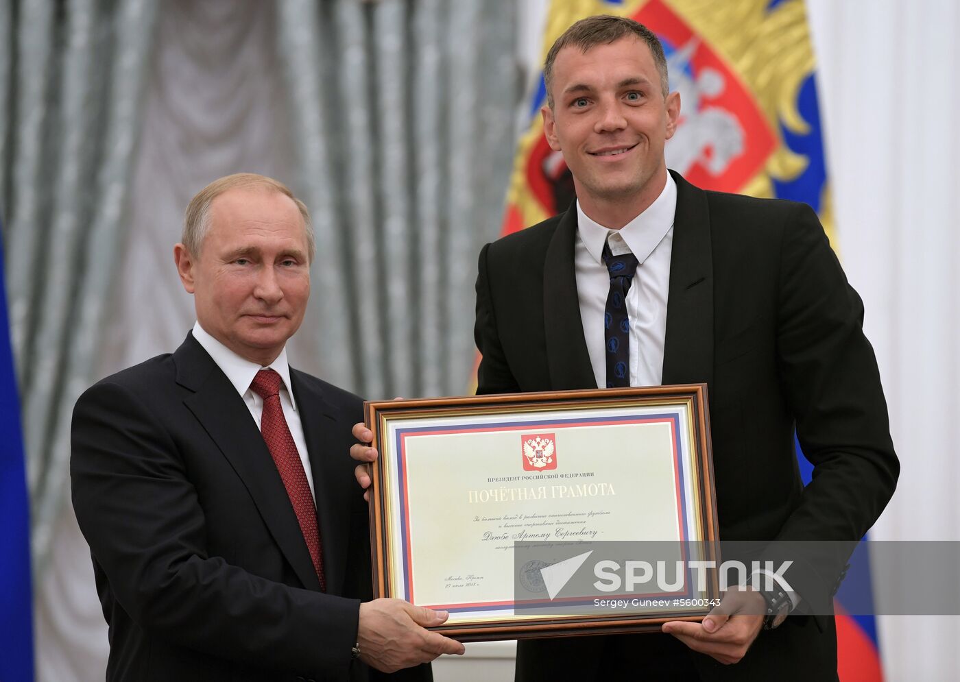 President Putin presents state decorations to Russian national footabll team