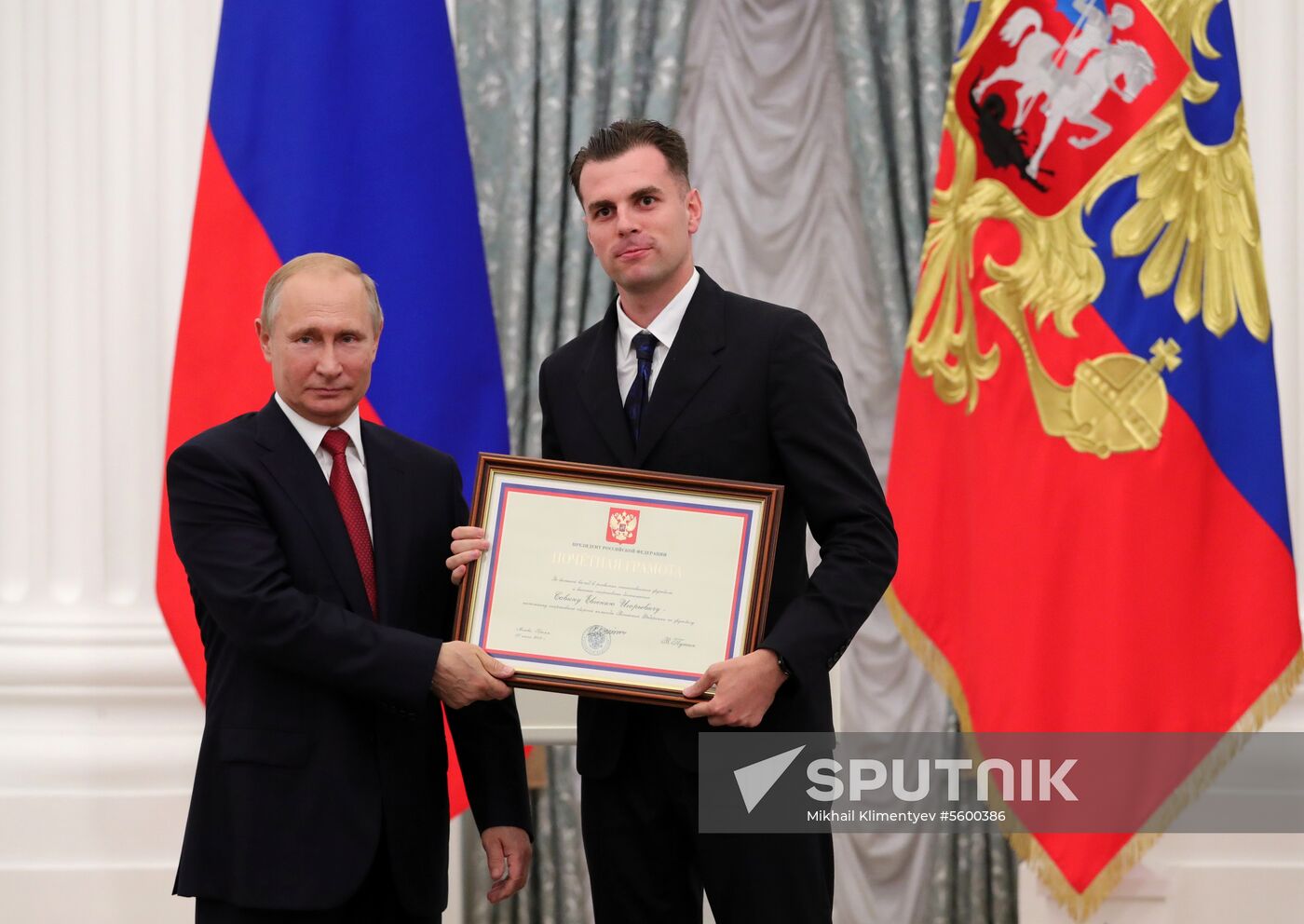 President Putin presents state decorations to Russian national footabll team