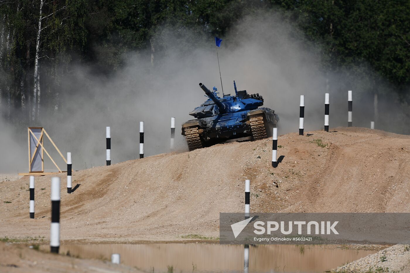 A tank of Team Russia competes in the individual race during the 2018 Tank Biathlon international competition at the Alabino range outside Moscow. Location: Russia, Moscow region, Alabino. Author: Evgeny Odinokov/Sputnik. 2018 Tank Biathlon. Individual race. Round one