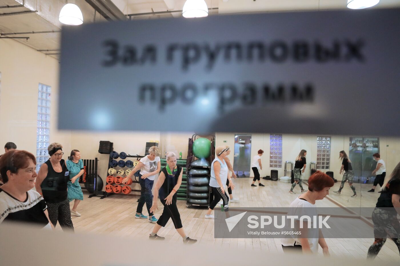 Seniors exercise in a fitness center