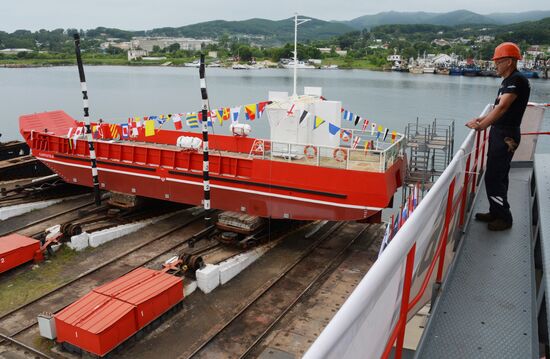 Launching a cargo-and-passenger barge in Primorye