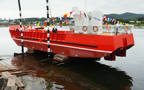 Launching a cargo-and-passenger barge in Primorye