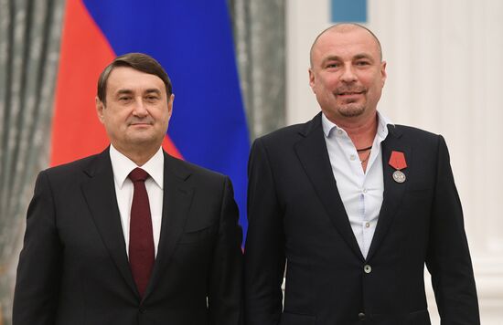Presidential Aide Igor Levitin presents awards to participants of Pyeongchang Olympics