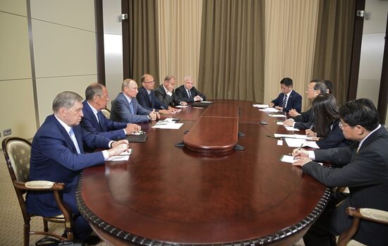 Russian President Vladimir Putin meets with Member of Politburo of Communist Party of China Yang Jiechi