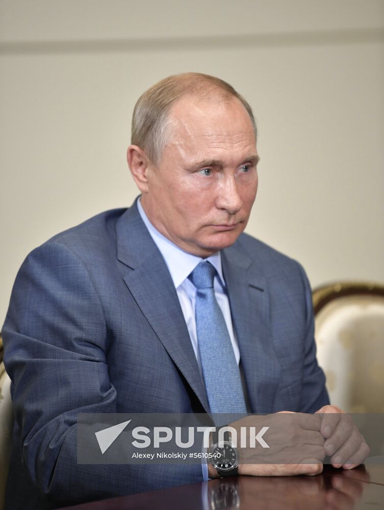 Russian President Vladimir Putin meets with Member of Politburo of Communist Party of China Yang Jiechi