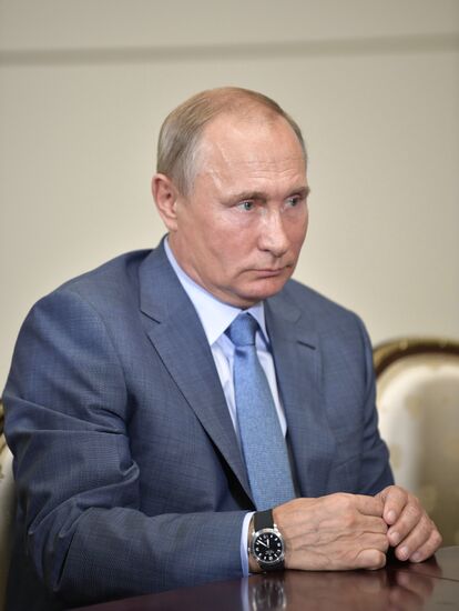 Russian President Vladimir Putin meets with Member of Politburo of Communist Party of China Yang Jiechi