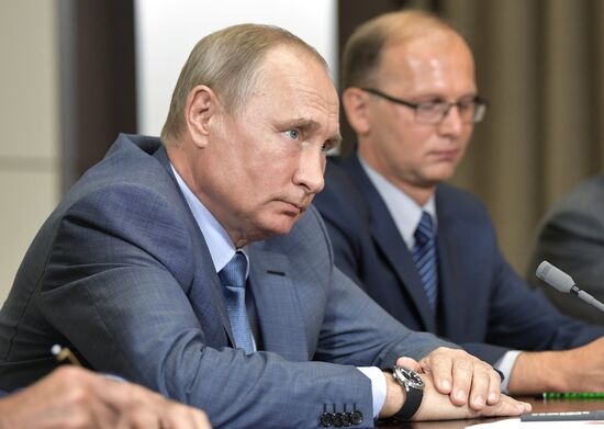 Russian President Vladimir Putin meets with Member of Politburo of Communist Party of China Yang Jiechi