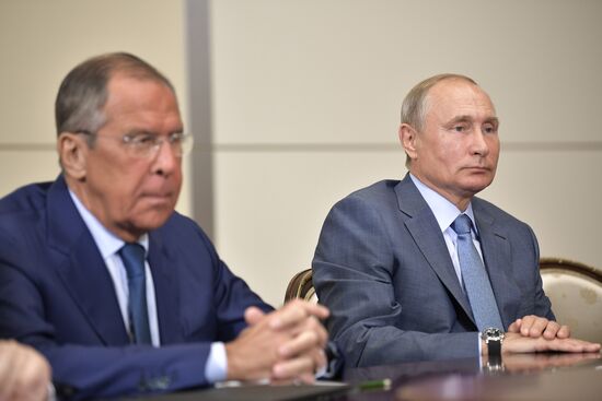 Russian President Vladimir Putin meets with Member of Politburo of Communist Party of China Yang Jiechi