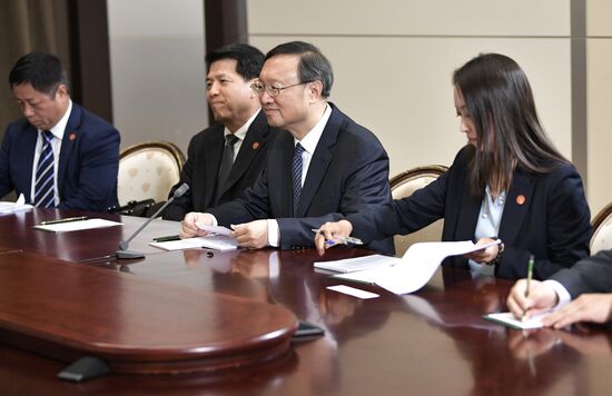 Russian President Vladimir Putin meets with Member of Politburo of Communist Party of China Yang Jiechi