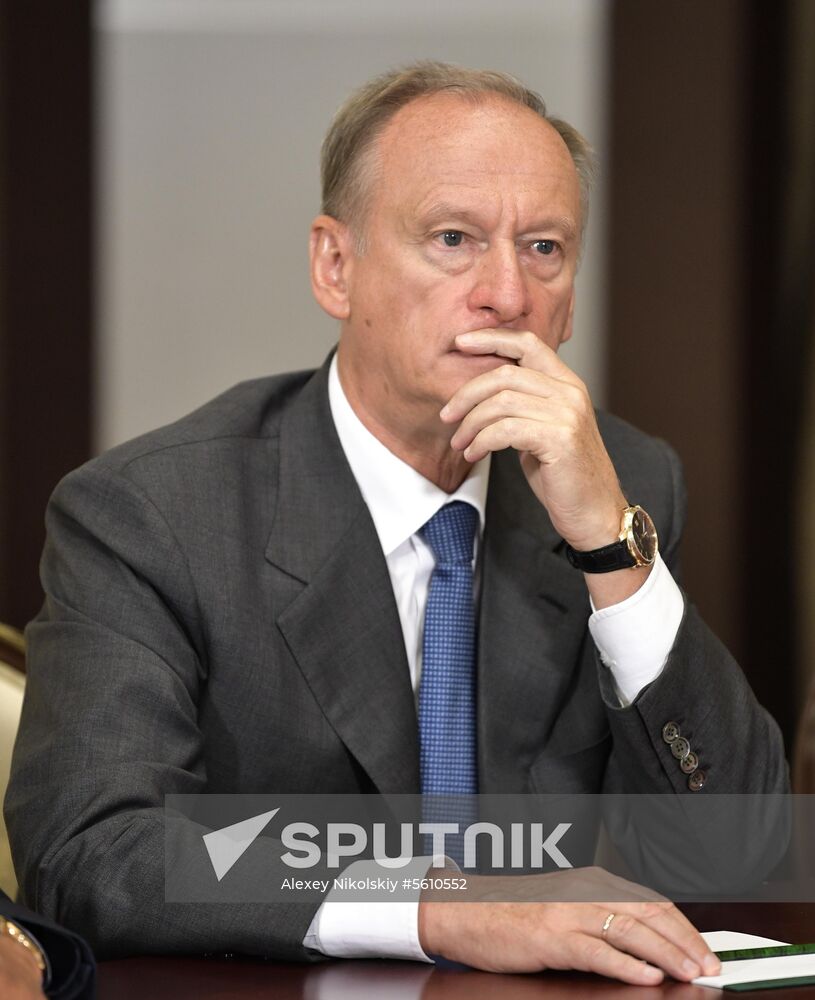 Russian President Vladimir Putin meets with Member of Politburo of Communist Party of China Yang Jiechi