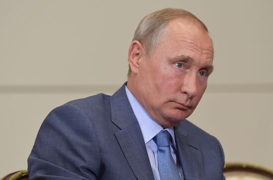 Russian President Vladimir Putin meets with Member of Politburo of Communist Party of China Yang Jiechi