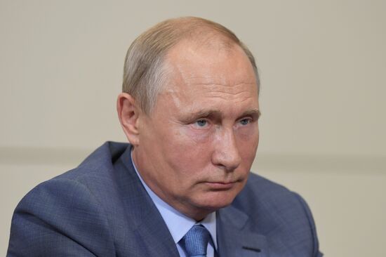 Russian President Vladimir Putin meets with Member of Politburo of Communist Party of China Yang Jiechi