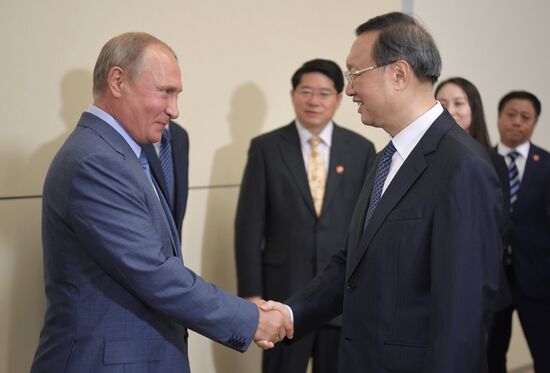 Russian President Vladimir Putin meets with Member of Politburo of Communist Party of China Yang Jiechi