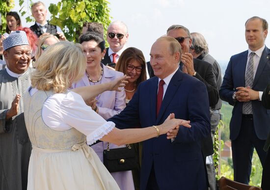 Russian President Vladimir Putin pays a visit to Austria