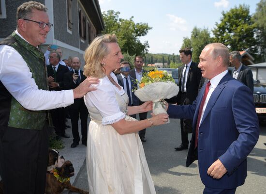 Russian President Vladimir Putin pays a visit to Austria