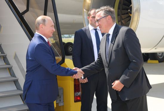 Russian President Vladimir Putin pays a visit to Austria