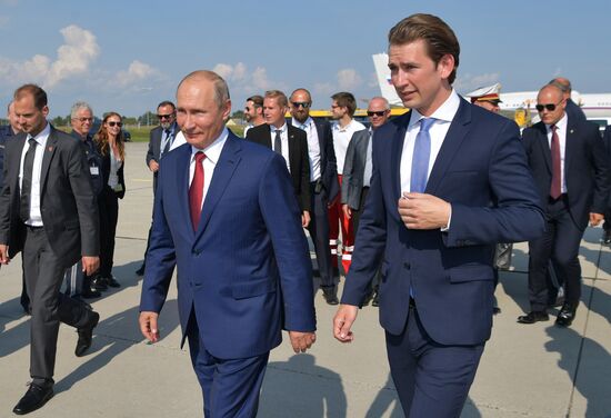 Russian President Vladimir Putin pays a visit to Austria