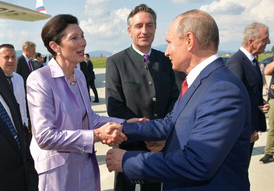 Russian President Vladimir Putin pays a visit to Austria